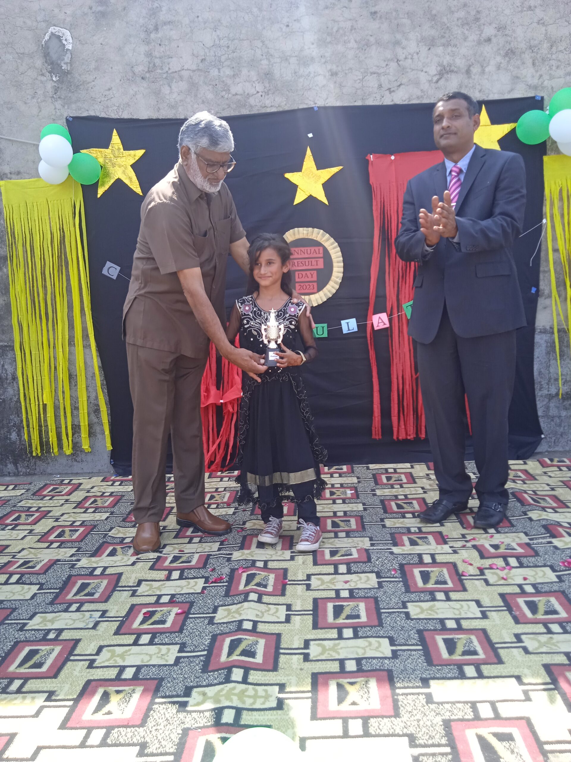 Digitate School management, Position holder and best performing Students Receiveng Cups and certificates on Final day 2023 Ceremony