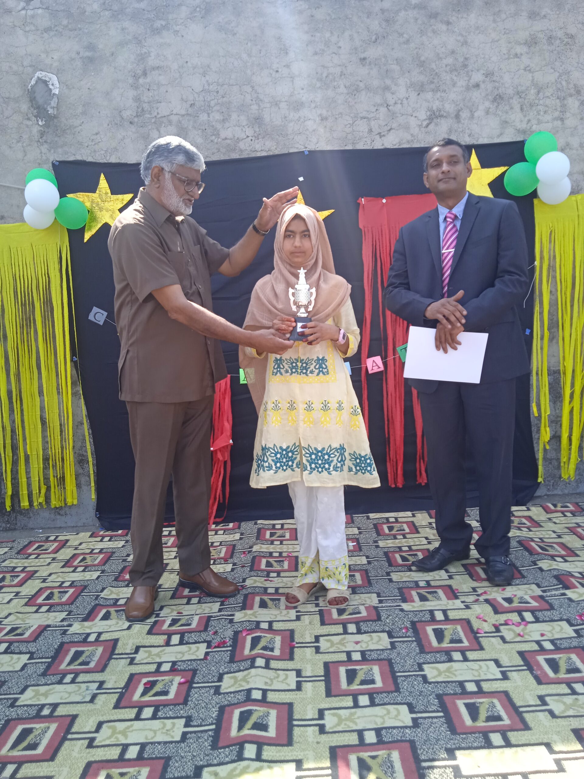 Digitate School management, Position holder and best performing Students Receiveng Cups and certificates on Final day 2023 Ceremony