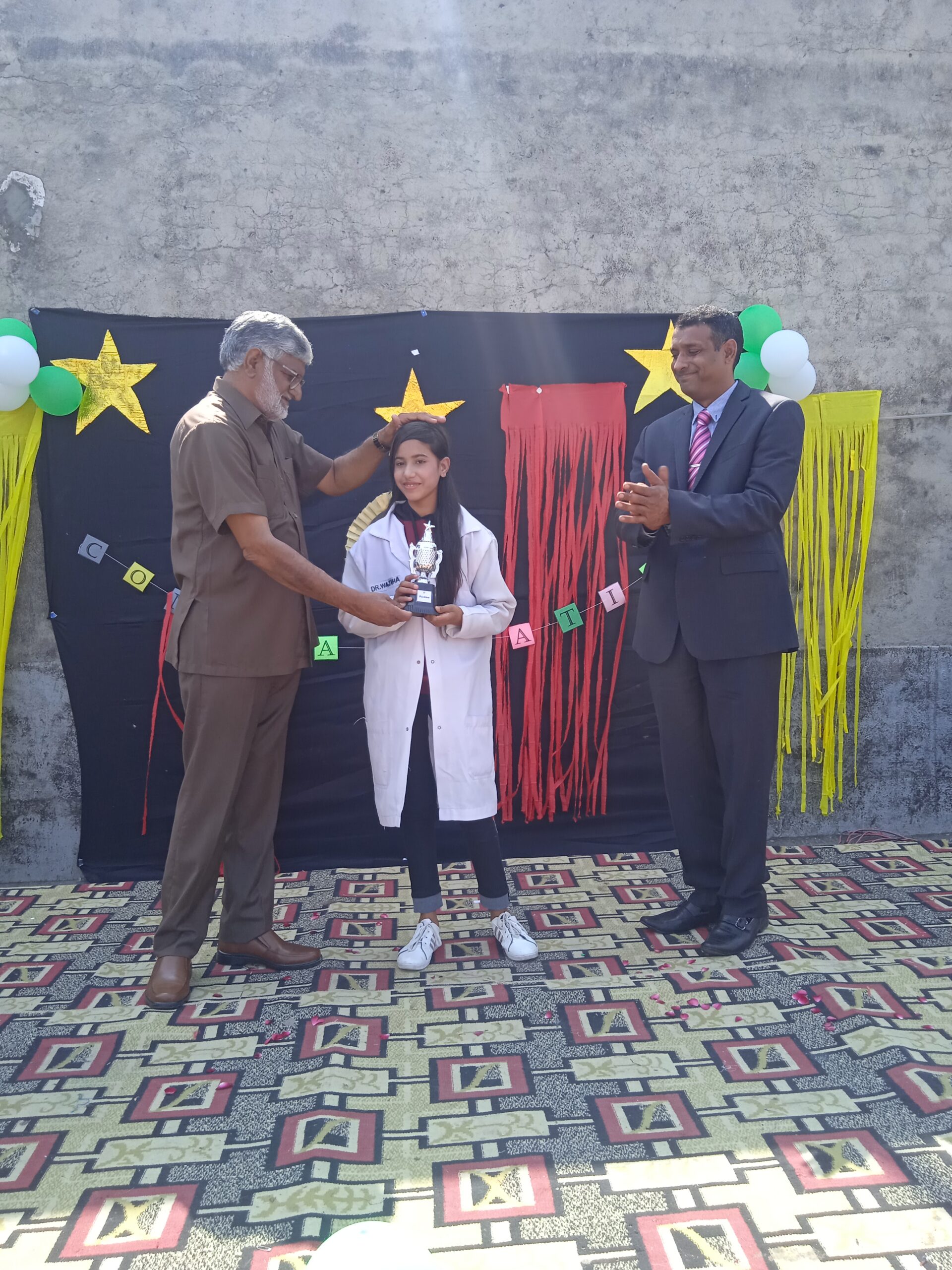 Digitate School management, Position holder and best performing Students Receiveng Cups and certificates on Final day 2023 Ceremony