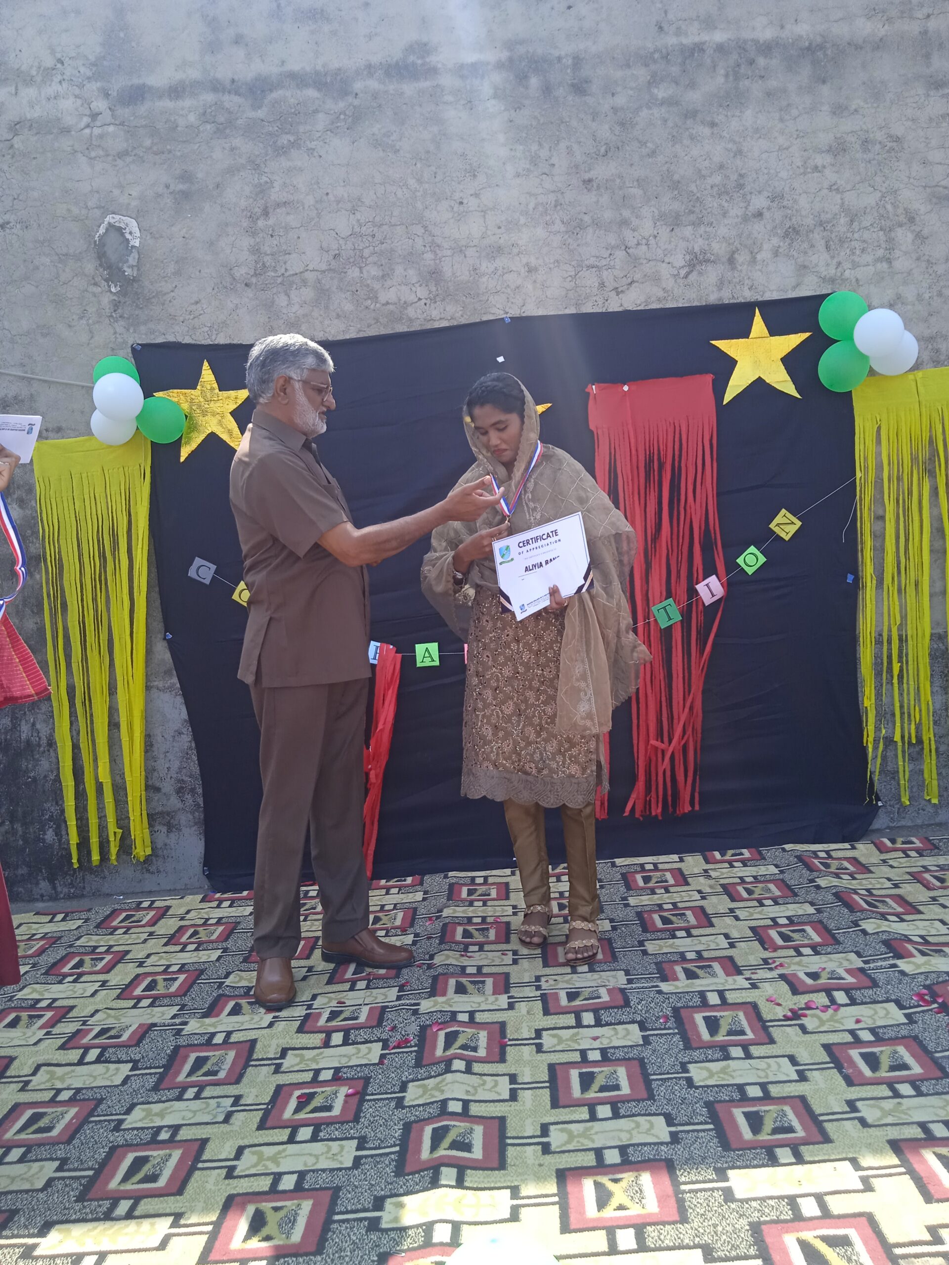 Digitate School management, Position holder and best performing Students Receiveng Cups and certificates on Final day 2023 Ceremony